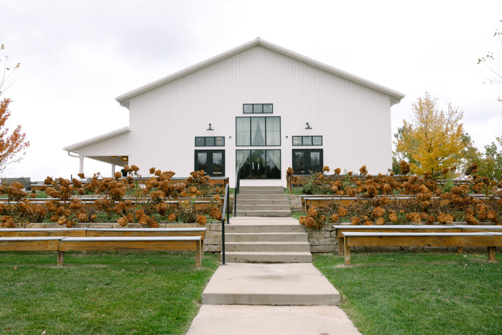 Ashton Hill Farm wedding venue exterior in Cedar Rapids, Iowa during fall wedding day
